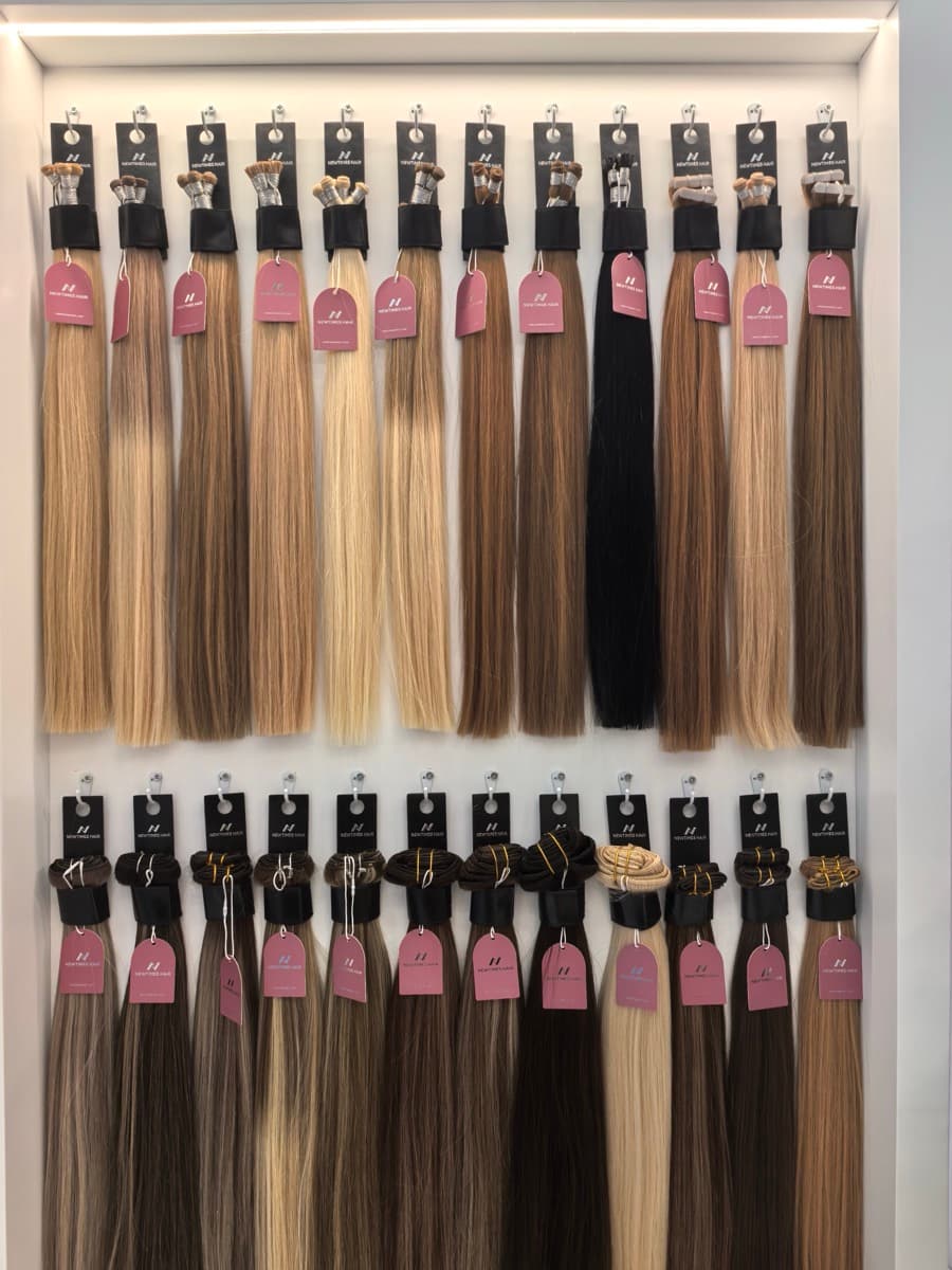 Color sample hair extensions displayed in rows