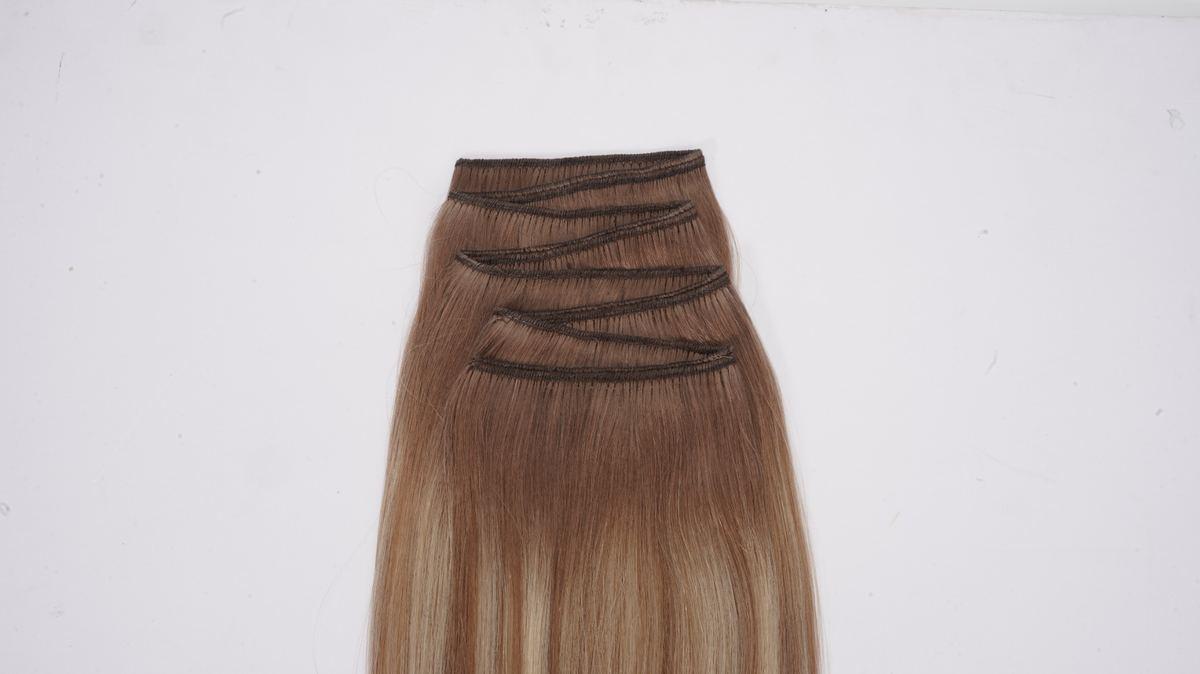 Machine Weft Remy human hair extensions with durable sewn tracks for salons and wholesale hair extension services