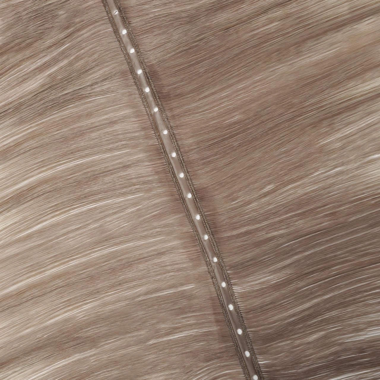 Close-up of a Twin-Genius Flip Weft with center-positioned bead holes and double-layer Genius-style construction for fuller volume.
